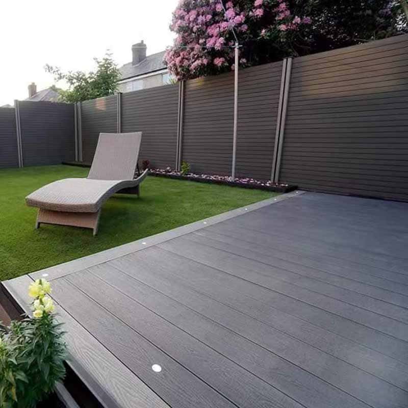 Creative reuse of leftover composite deck boards in a garden